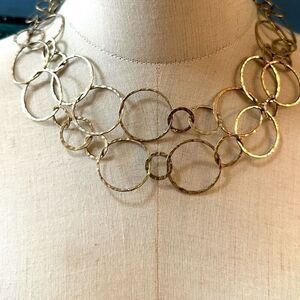 Gold tone circle double strand necklace